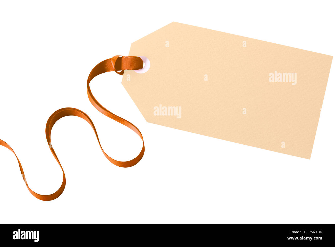 Gift tag gold ribbon isolated white background Stock Photo - Alamy