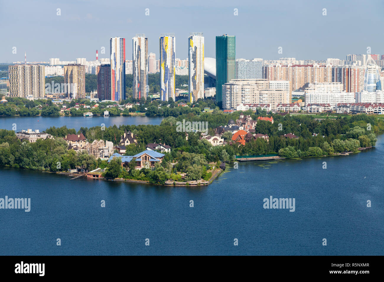 cottage village on island and apartment houses Stock Photo