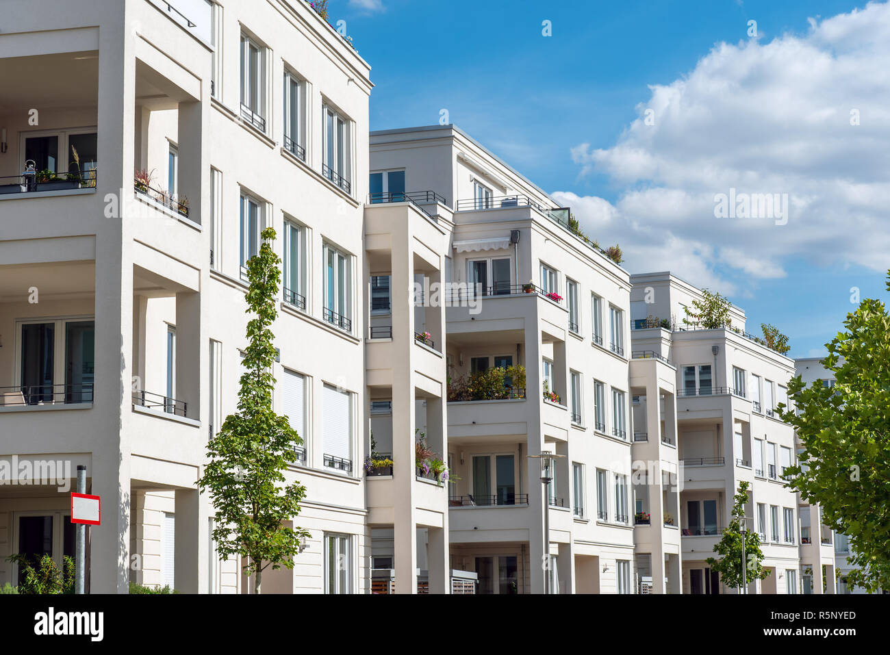 Row of white modern apartment houses seen in Berlin, Germany Stock Photo