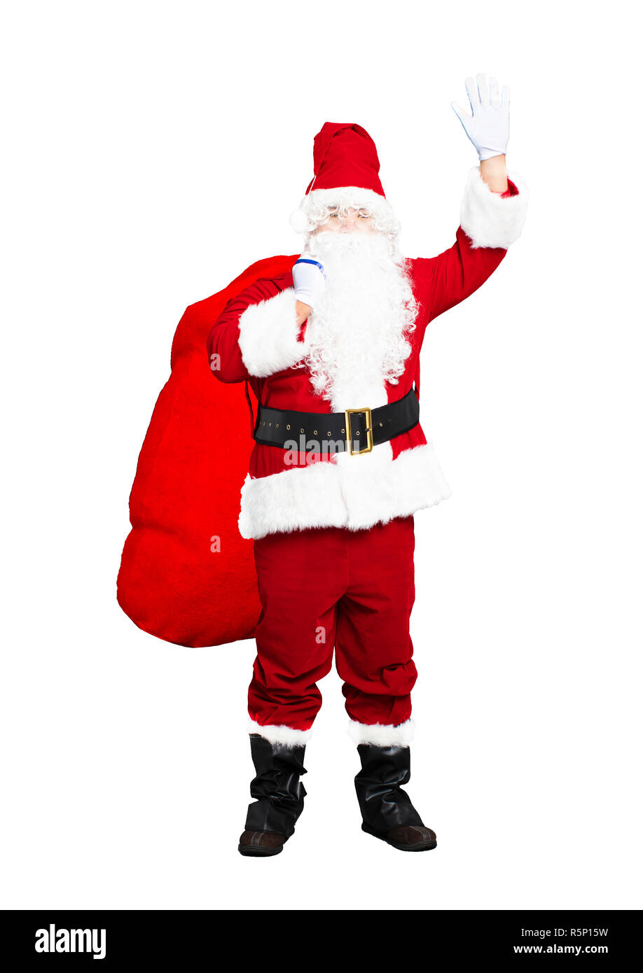 Santa Claus carrying big bag Stock Photo - Alamy