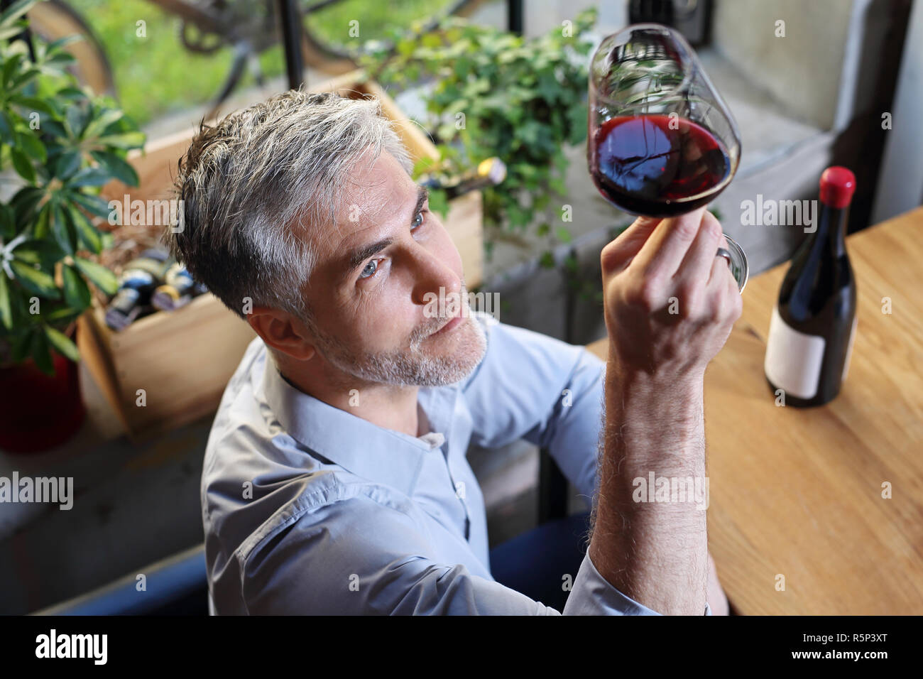 Glass of wine. Man drinking wine Stock Photo - Alamy