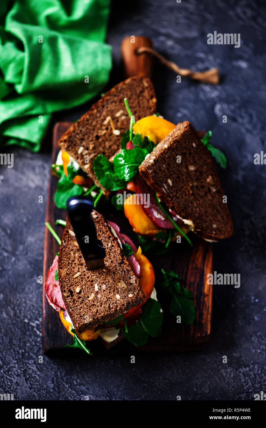 peach and pastrami sandwiches with peppery mayo. selective focus Stock Photo
