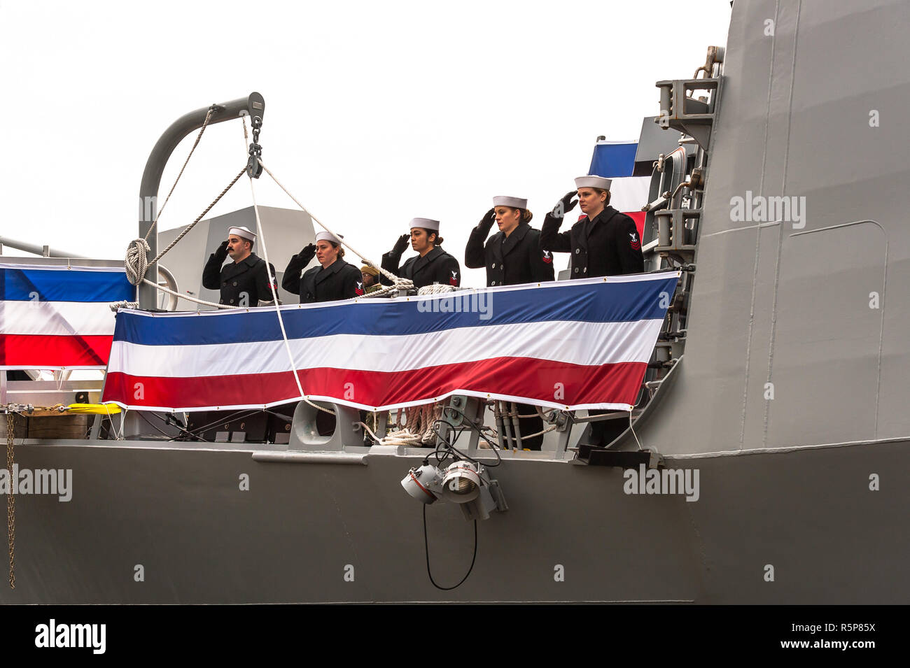 Boston, Massachusetts, USA. 1st December, 2018. Black Falcon Terminal, Boston, Massachusetts. 1st December, 2018. Sailors closing the commissioning ceremony for the USS Hudner (DDG116). Maia Kennedy/Alamy Live News Stock Photo
