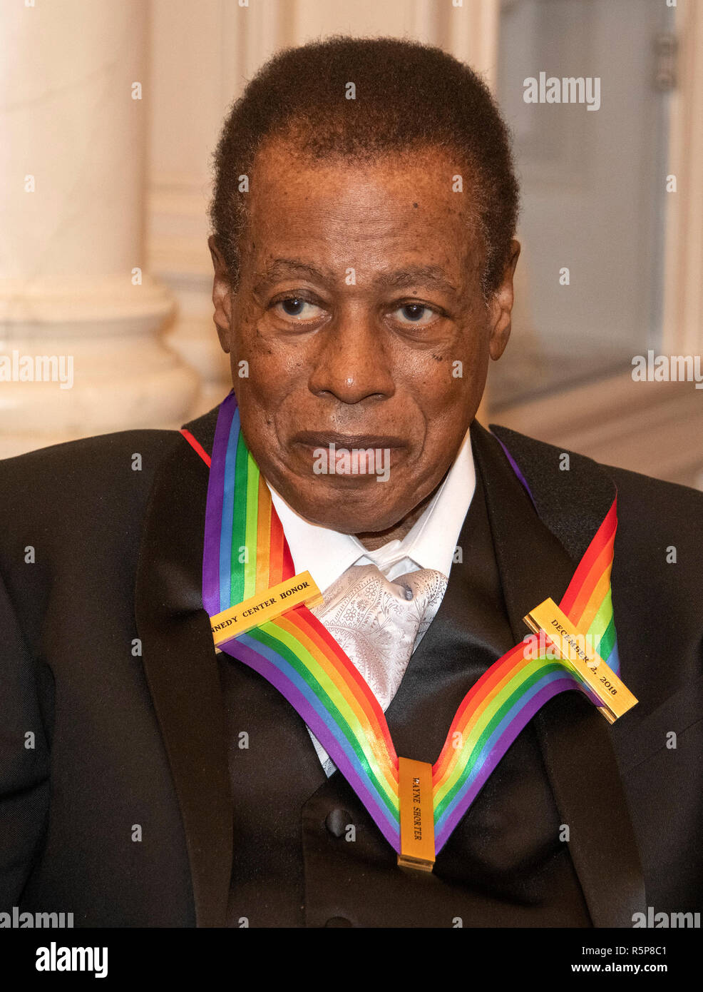 Wayne Shorter, one of the recipients of the 41st Annual Kennedy Center Honors, as he poses for a group photo following a dinner hosted by United States Deputy Secretary of State John J. Sullivan in their honor at the US Department of State in Washington, DC on Saturday, December 1, 2018. The 2018 honorees are: singer and actress Cher; composer and pianist Philip Glass; Country music entertainer Reba McEntire; and jazz saxophonist and composer Wayne Shorter. This year, the co-creators of Hamilton, writer and actor Lin-Manuel Miranda; director Thomas Kail; choreographer Andy Blankenbuehler; an Stock Photo