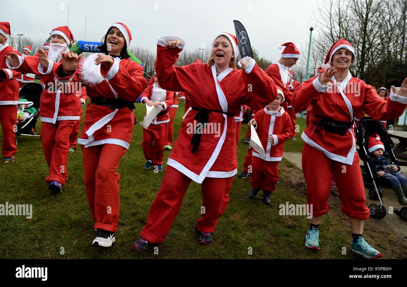 Weldmar Hospicecare Charity Family Santa Fun Run, Dorchester Credit: Finnbarr Webster/Alamy Live News Stock Photo
