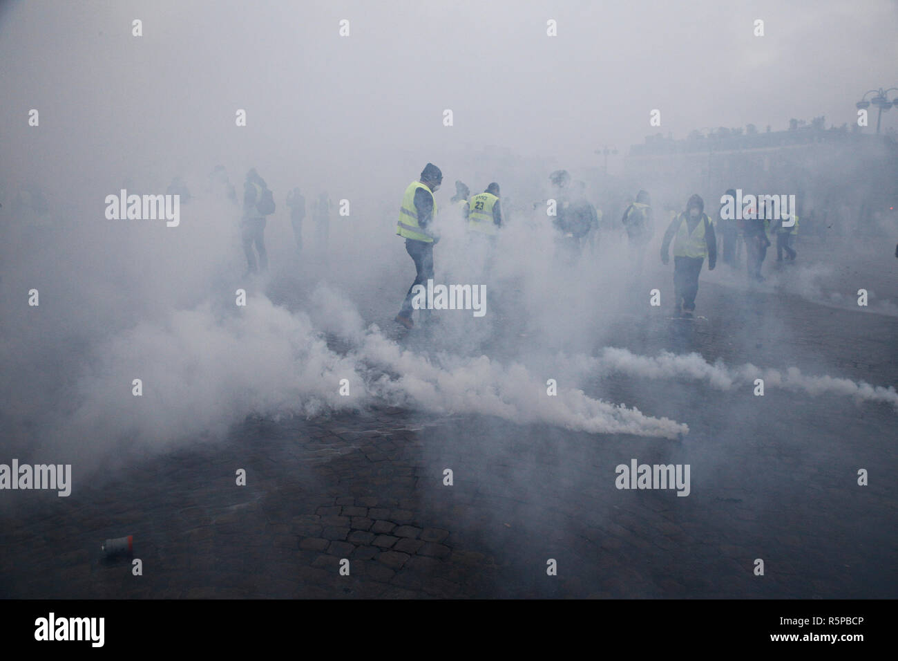 Paris, France. 1st December 2018. Riot Police uses a water canon and ...