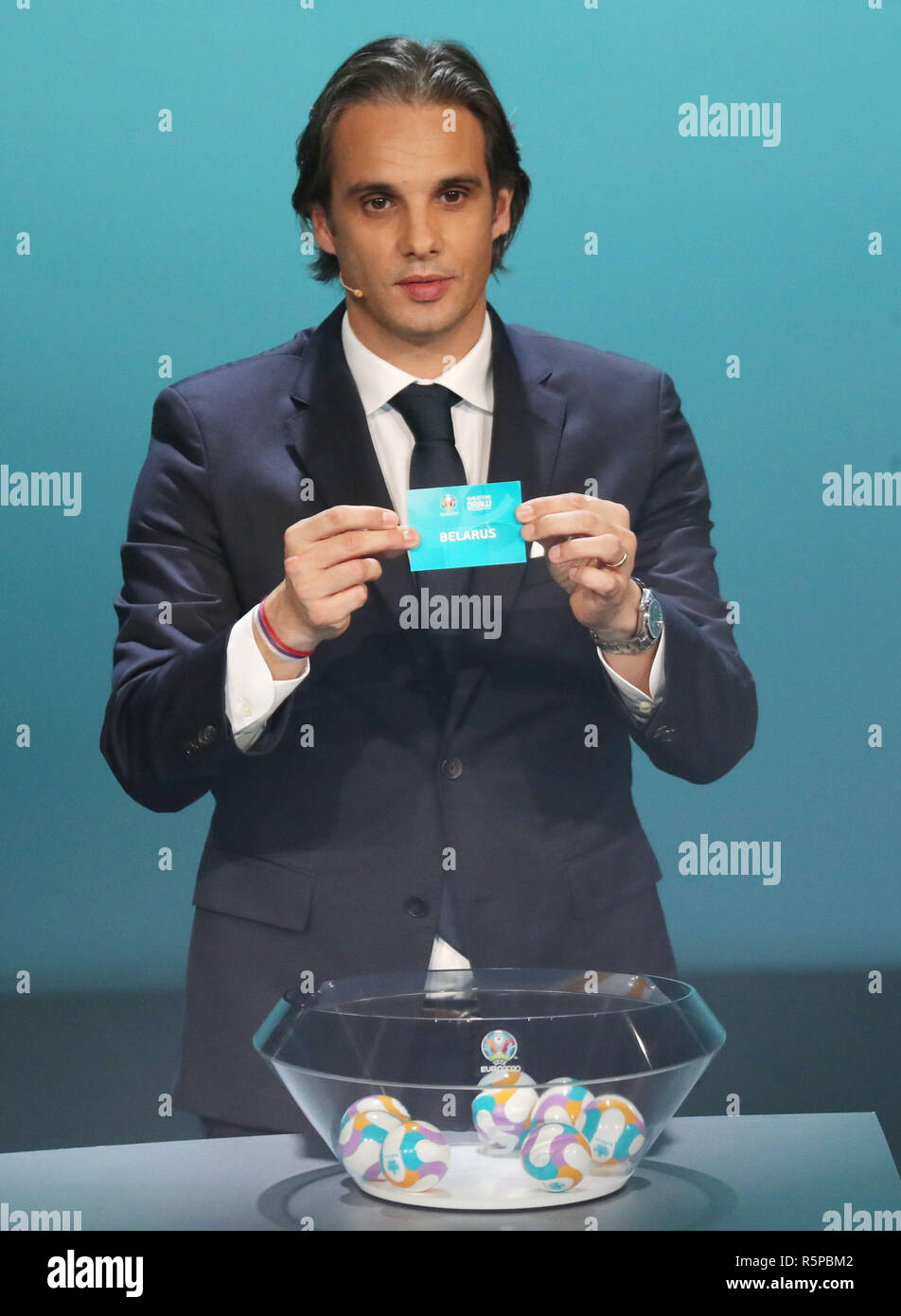 Dublin, Ireland. 02nd Dec, 2018. Nuno Gomes from Portugal shows the lot of Belarus at the draw of the qualification groups for the EM 2020. Credit: Christian Charisius/dpa/Alamy Live News Stock Photo