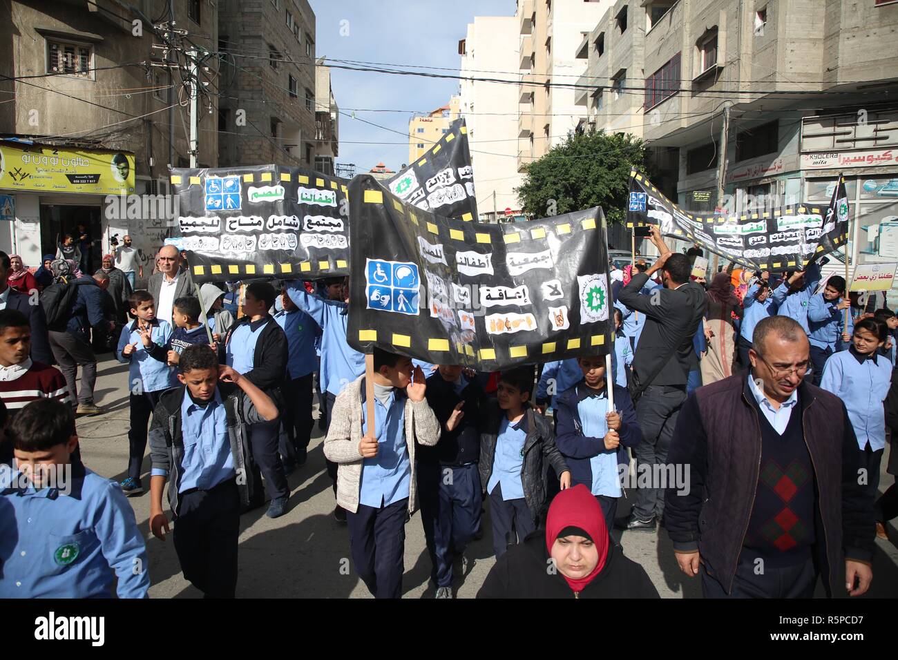 Gaza City, The Gaza Strip, Palestine. 2nd Dec, 2018. Disabled Palestinians take part taking part in rally in front of the UN quarter in Gaza city demanding the protection of disabled rights. Credit: Hassan Jedi/Quds Net News/ZUMA Wire/Alamy Live News Stock Photo
