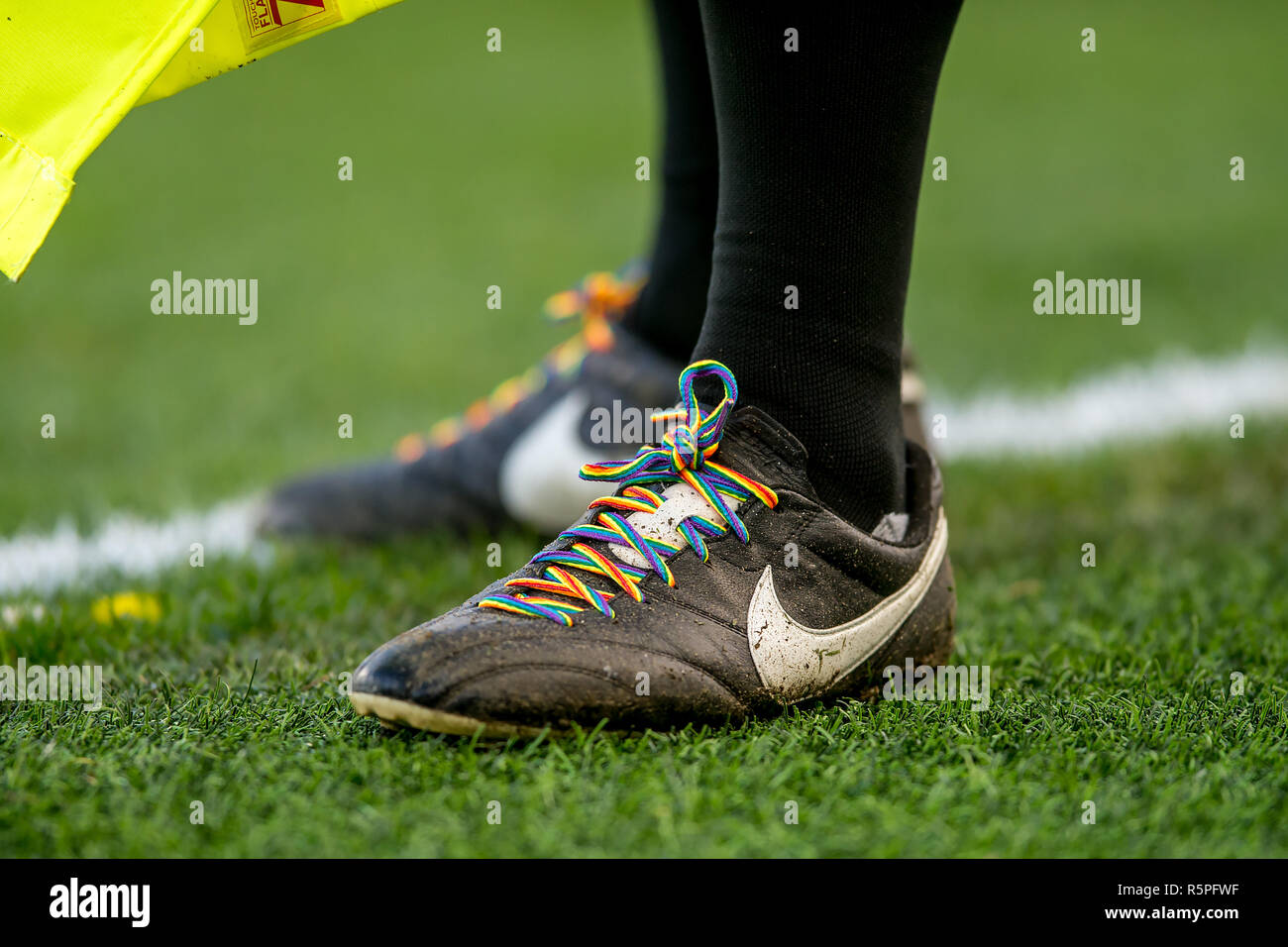 London, UK. 2nd Dec 2018. Referee is wearing rainbow colour laces on his  boots during the Premier League match between Chelsea and Fulham at  Stamford Bridge, London, England on 2 December 2018.
