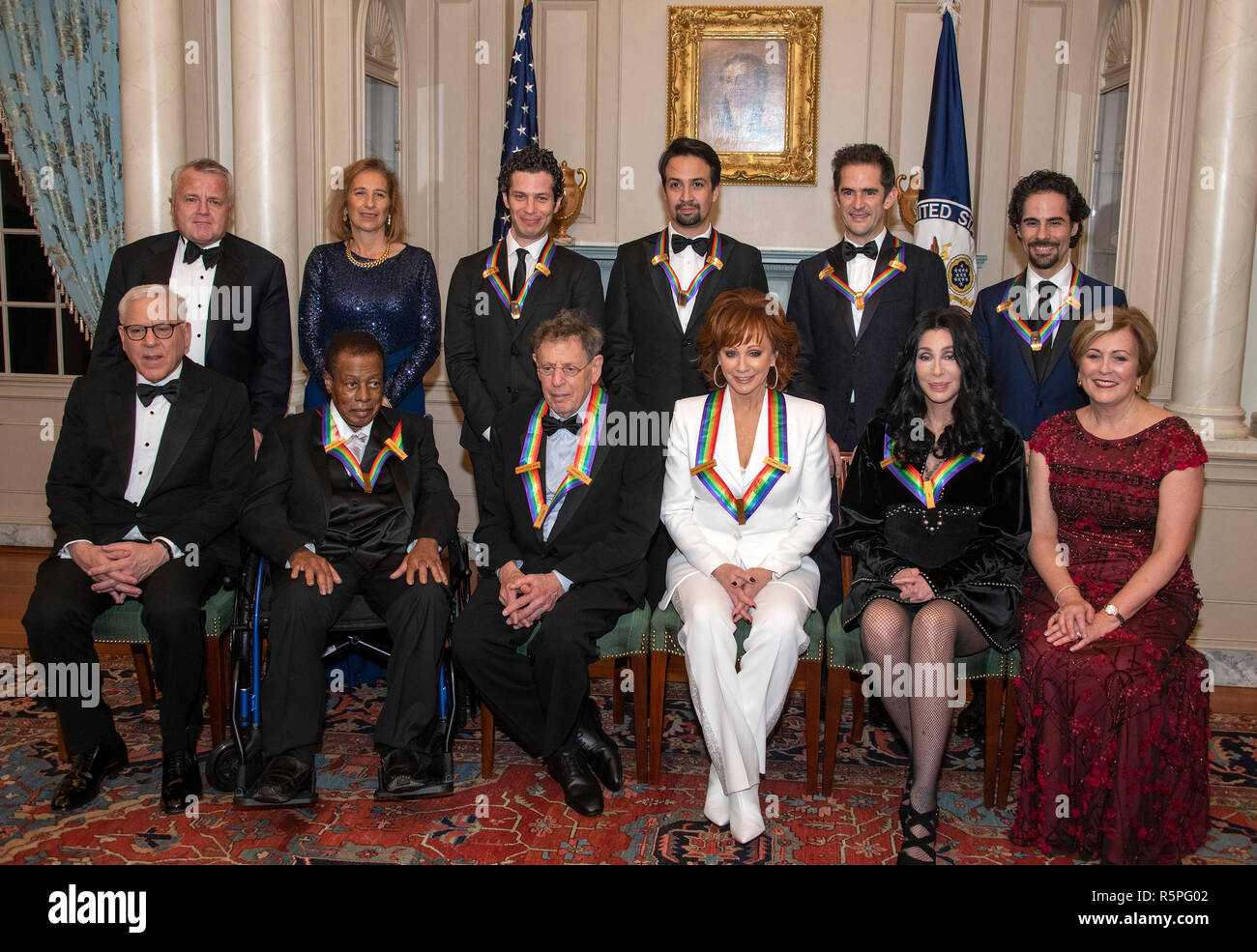 Washington, USA. 1st Dec 2018. The recipients of the 41st Annual Kennedy Center Honors pose for a group photo following a dinner hosted by United States Deputy Secretary of State John J. Sullivan in their honor at the US Department of State in Washington, DC on Saturday, December 1, 2018. Credit: MediaPunch Inc/Alamy Live News Stock Photo