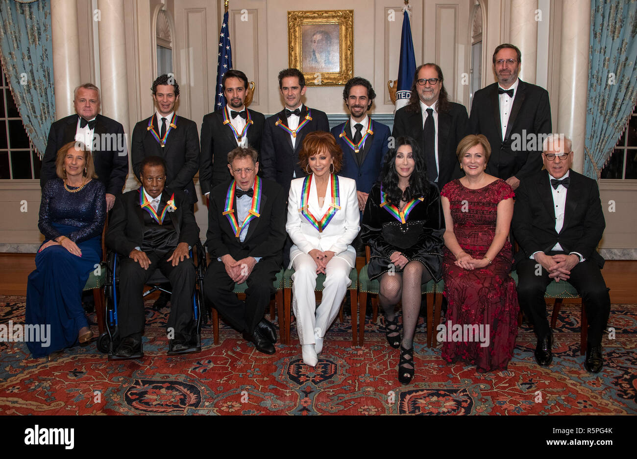 Washington, USA. 1st Dec 2018. The recipients of the 41st Annual Kennedy Center Honors pose for a group photo following a dinner hosted by United States Deputy Secretary of State John J. Sullivan in their honor at the US Department of State in Washington, DC on Saturday, December 1, 2018. Credit: MediaPunch Inc/Alamy Live News Stock Photo