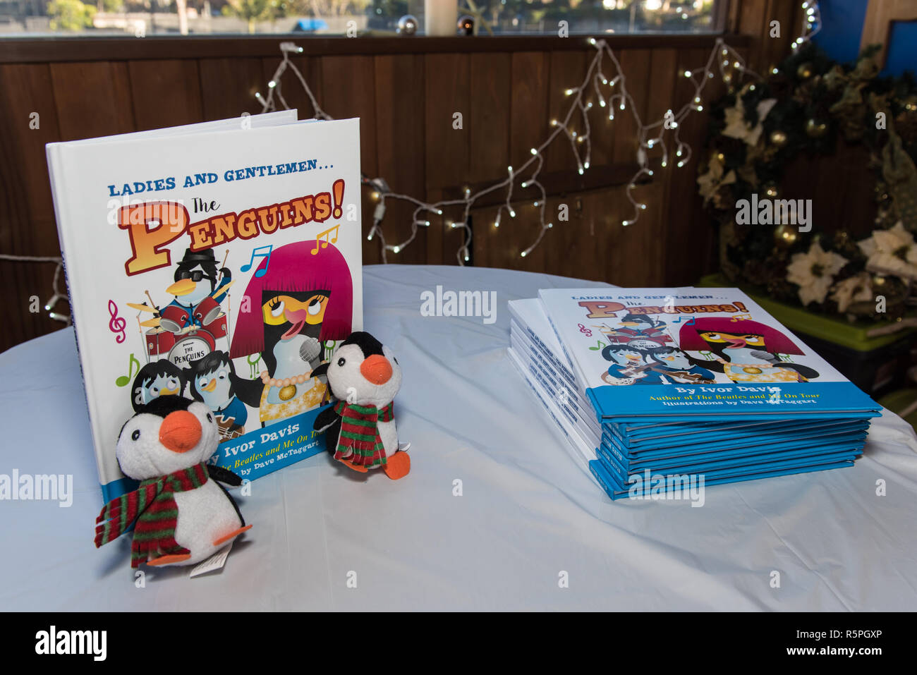 California, USA. 1st Dec 2018. Newly released children's book stacked on table and ready to sell at book signing at Pierpont Racquet Club in Ventura, California, USA on December 1, 2018. Credit: Jon Osumi/Alamy Live News Stock Photo