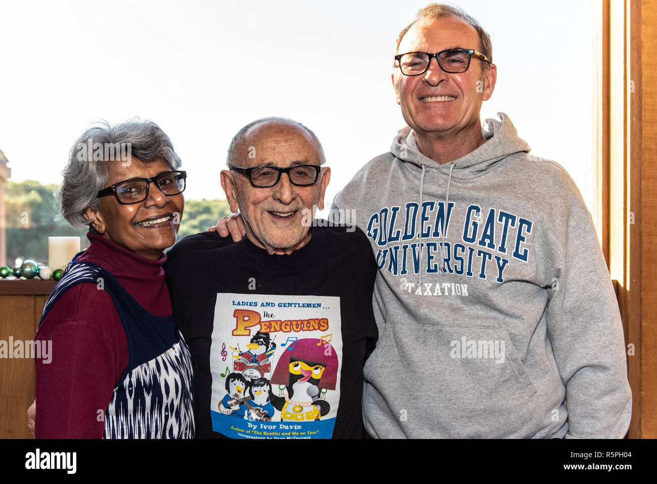 California, USA. 1st Dec 2018. Author, Ivor Davis with Janet and Mark Goldenson at book signing at Pierpont Racquet Club in Ventura, California, USA on December 1, 2018. Credit: Jon Osumi/Alamy Live News Stock Photo