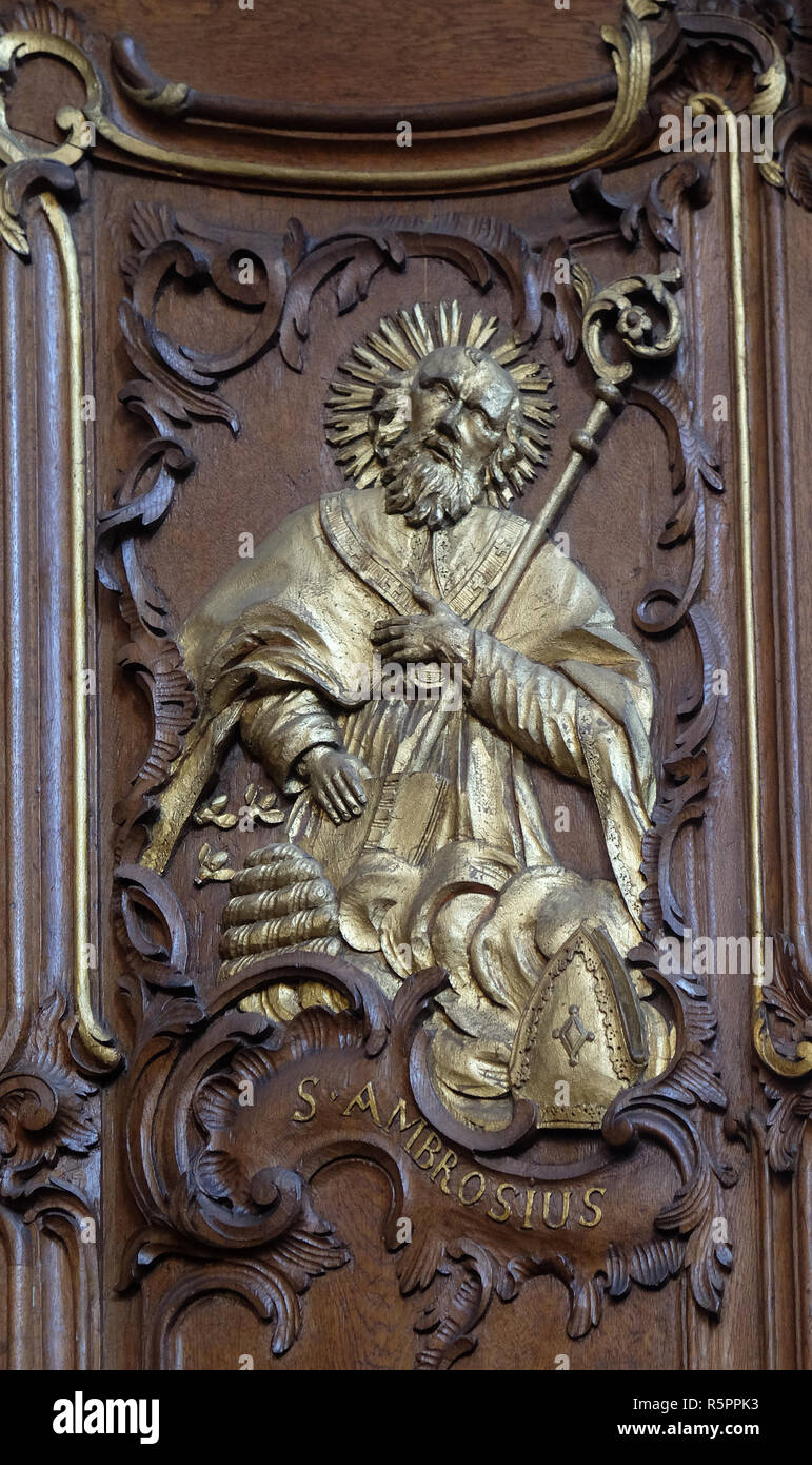 Saint Ambrose, one of the Latin Fathers of the Church, choir stalls by Daniel Aschauer in Cistercian Abbey of Bronbach in Reicholzheim near Wertheim,  Stock Photo