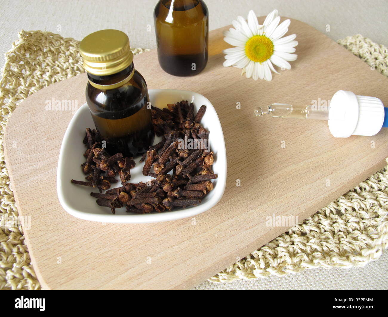 homemade insect repellent with clove oil for the skin to the inset