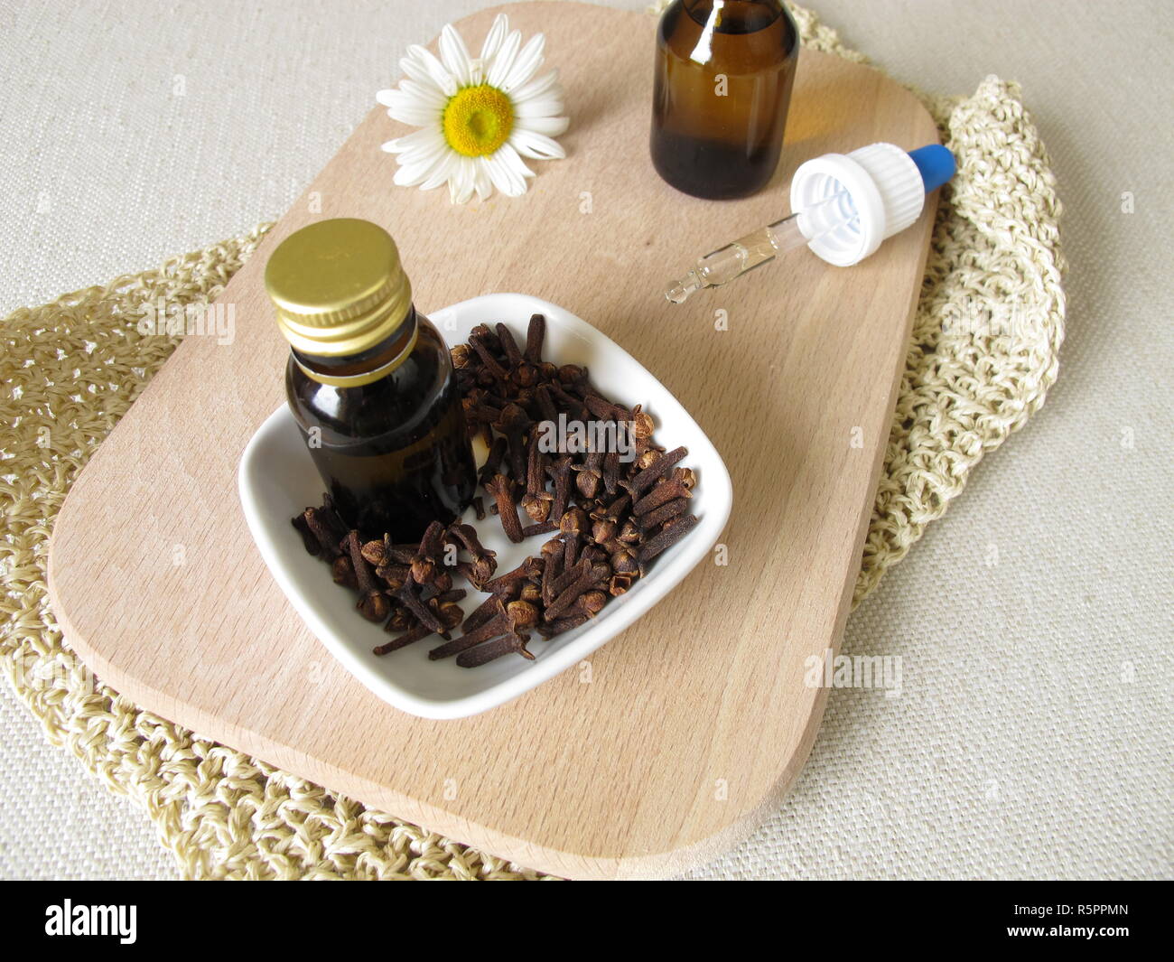 homemade insect repellent with clove oil for the skin to the inset