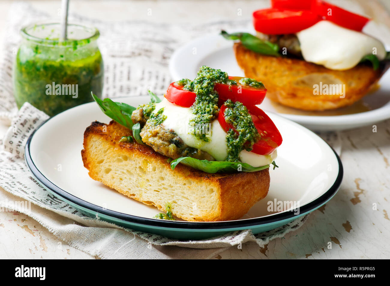 open face chicken mozzarella melts burgers..style rustic .selective