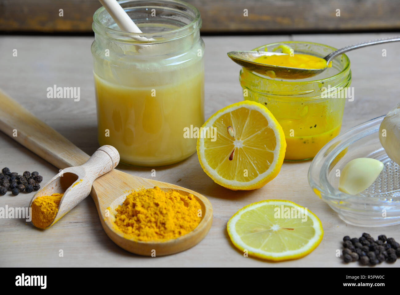 homemade natural antibiotic with honey golden honey turmeric Stock