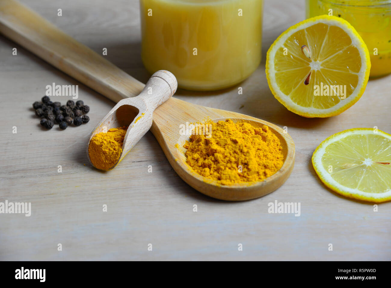 homemade natural antibiotic with honey golden honey turmeric Stock