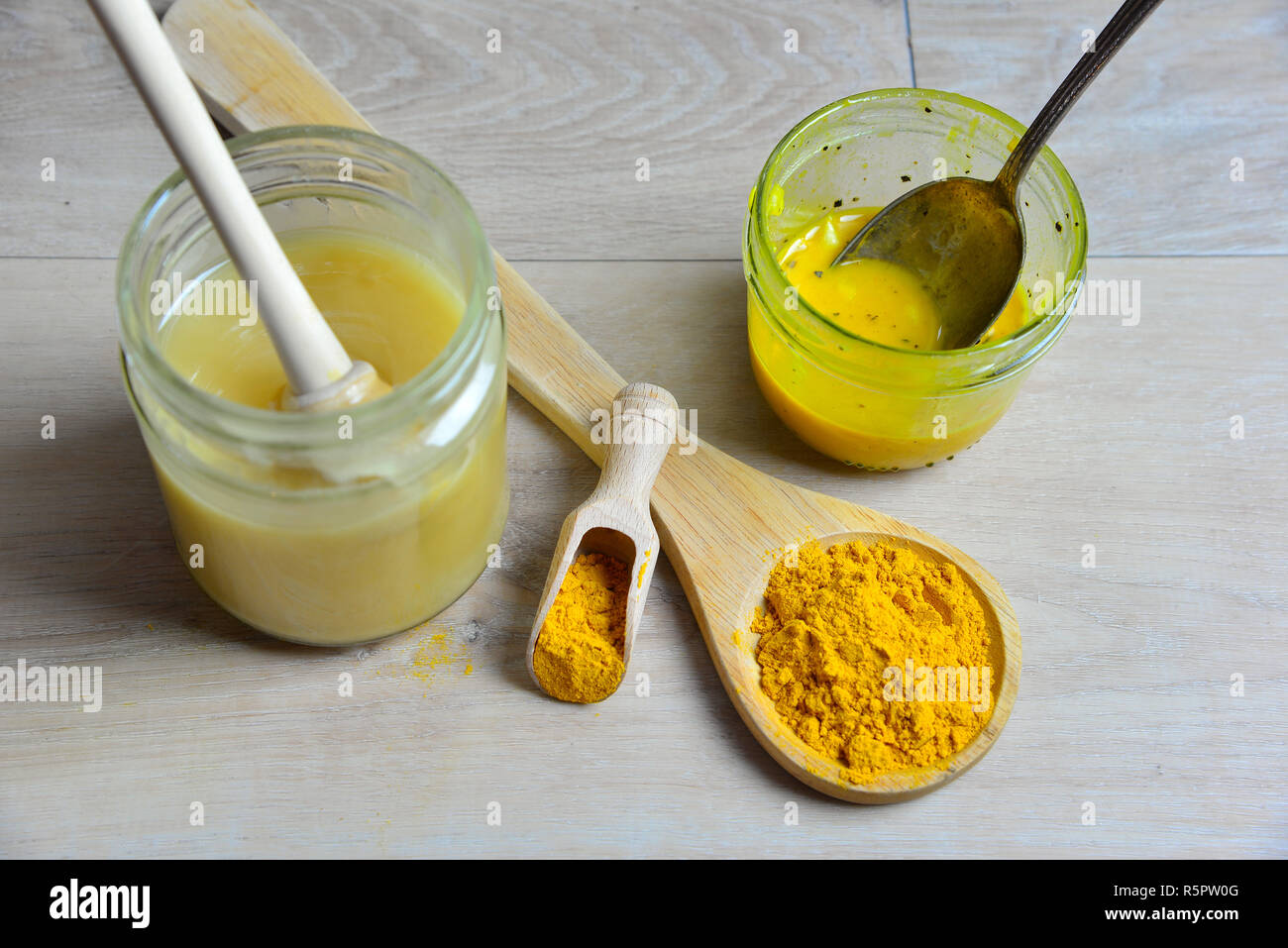 homemade natural antibiotic with honey golden honey turmeric Stock