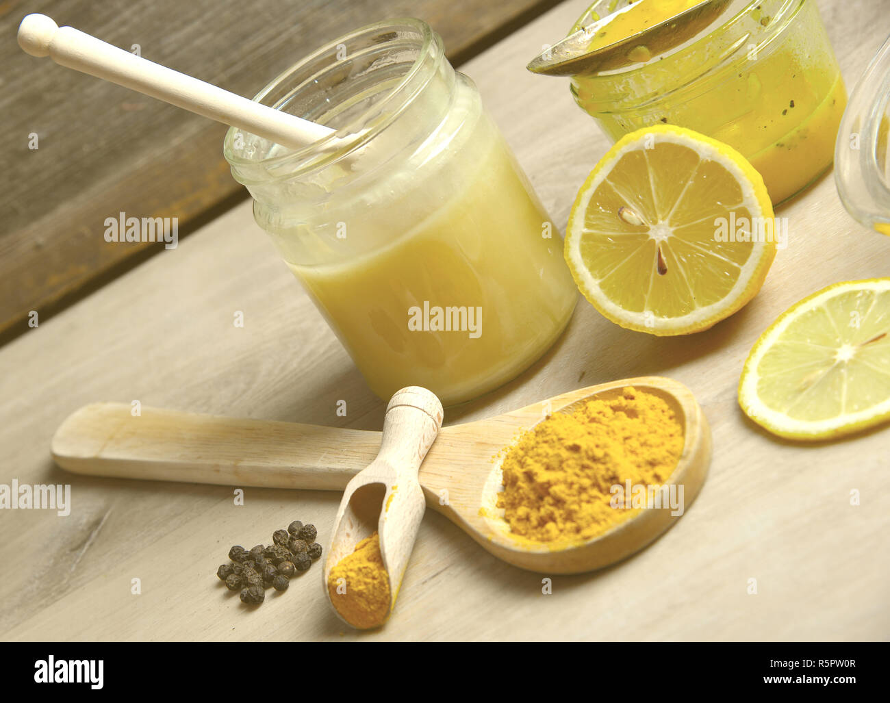 homemade natural antibiotic with honey golden honey turmeric Stock