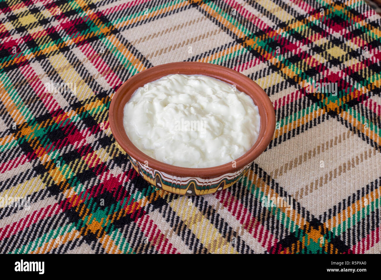Eating a traditional bulgarian yogurt from a bowl Stock Photo