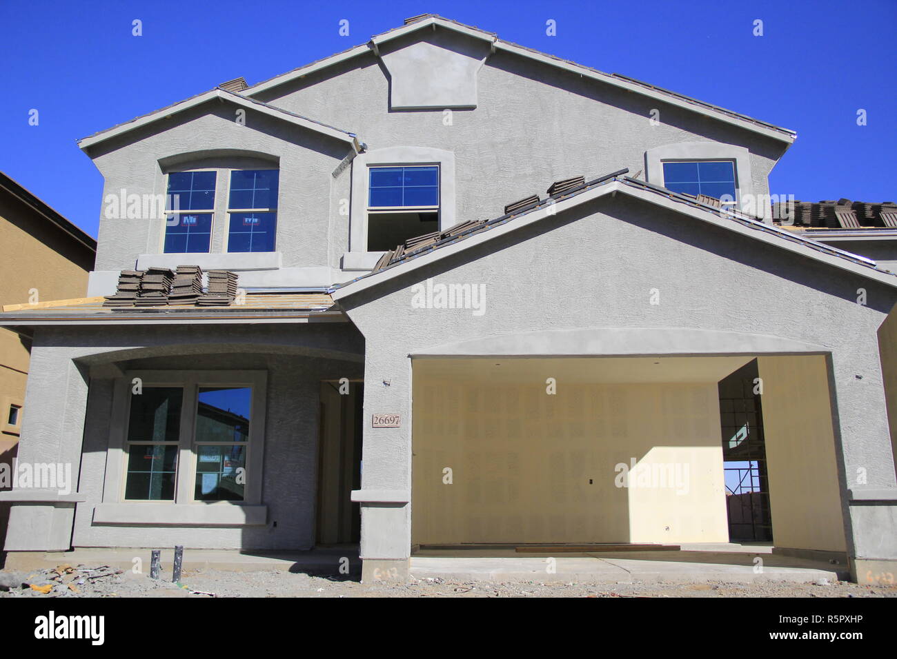 New Two Story House Under Construction Stock Photo