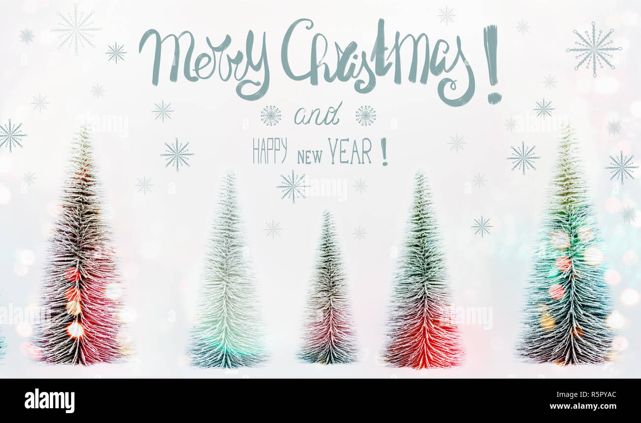 Merry Christmas and Happy New Year greeting card with text lettering ...