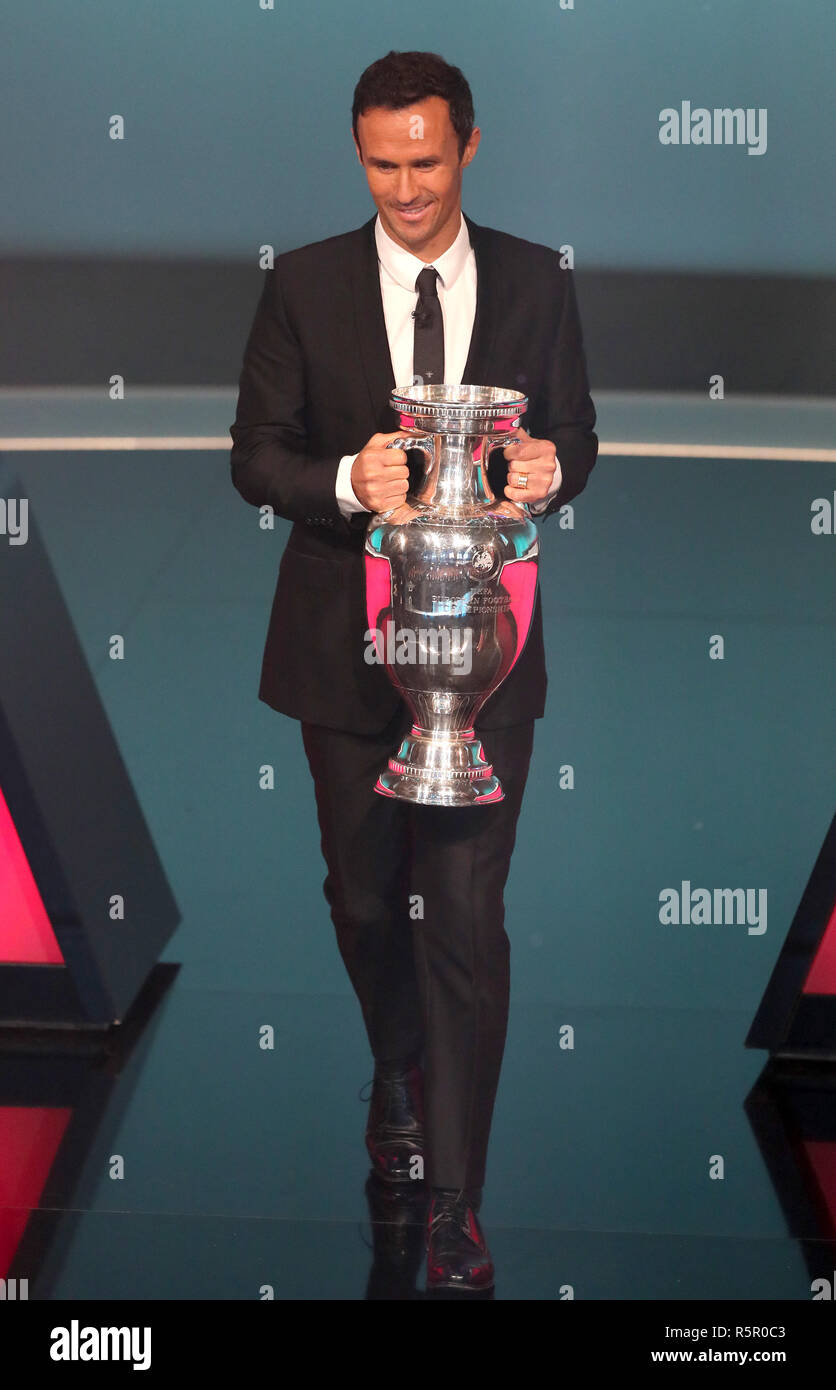 Former Portugal player Ricardo Carvalho brings out the Euro 2020 trophy during the Euro 2020 European qualifier draw at the Convention Centre, Dublin. Stock Photo