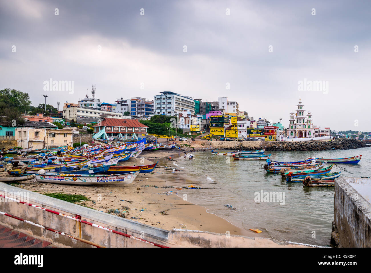 View of Kanyakumari Town with boats on beach Stock Photo