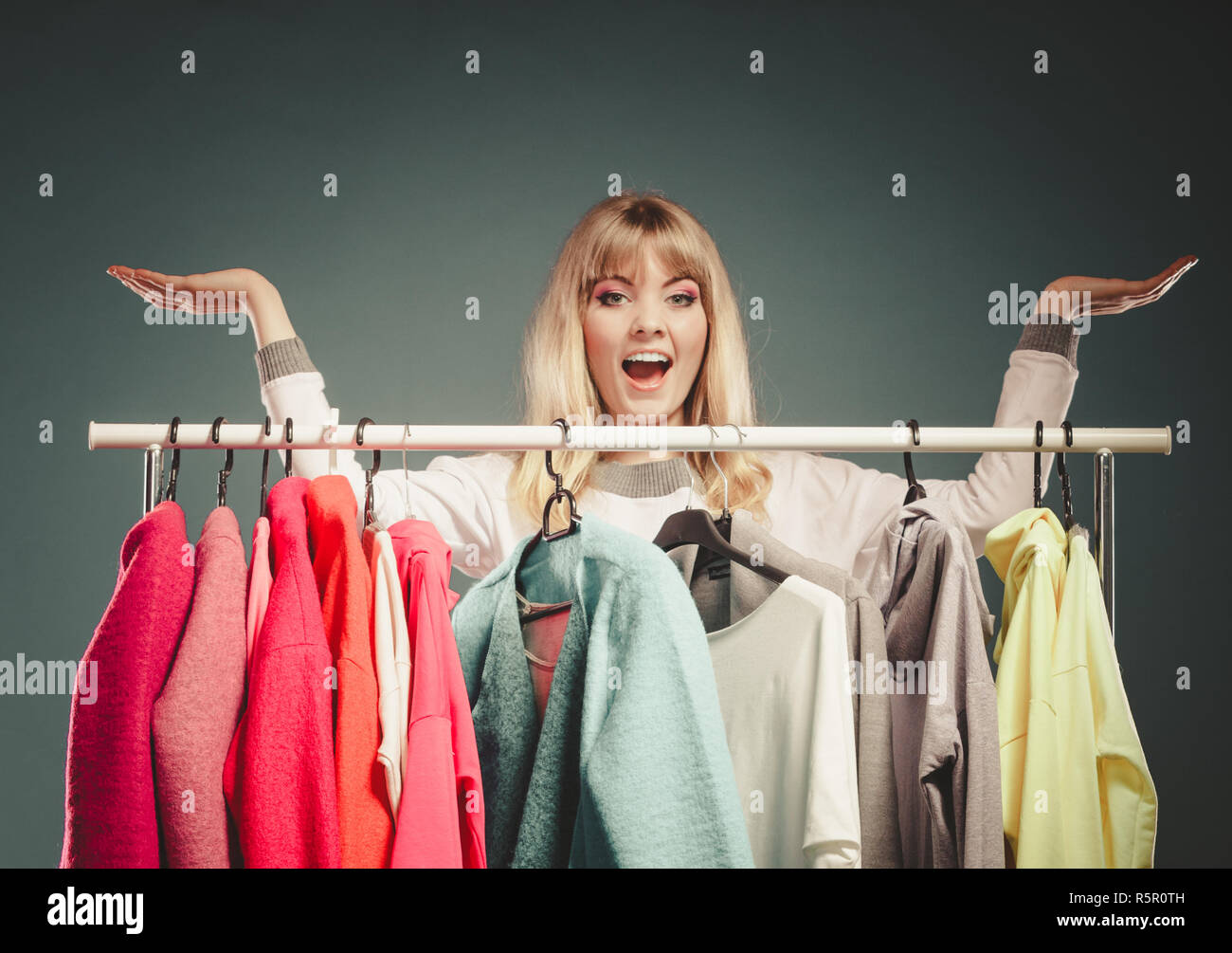 Happy Smiling Pretty Woman With Open Palms Hands For Copy Space In