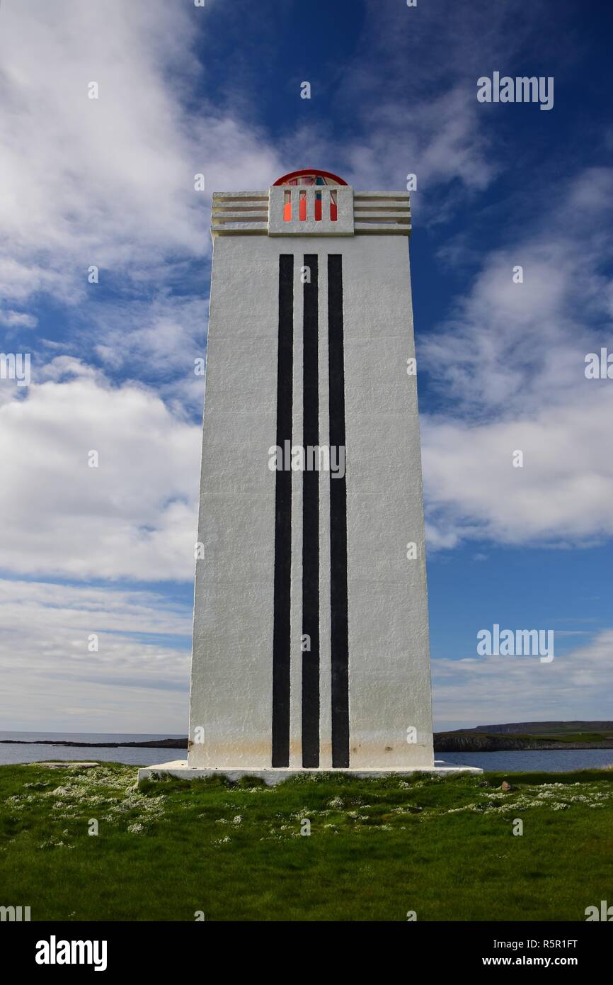The lighthouse at Kalfshamarsvik on peninsula Skagi in Iceland. A white
