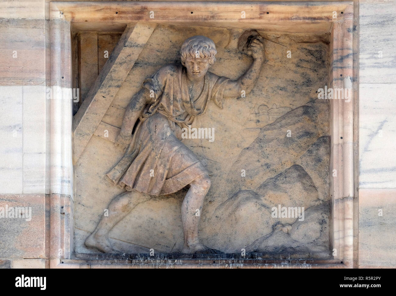 Samson carries away the Gates of Gaza. Marble relief on the facade of the Milan Cathedral , Duomo di Santa Maria Nascente, Milan, Lombardy, Italy Stock Photo