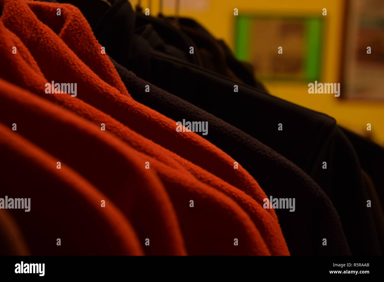 polar fleece jackets on hanger in a sales room, colorful polar fleece