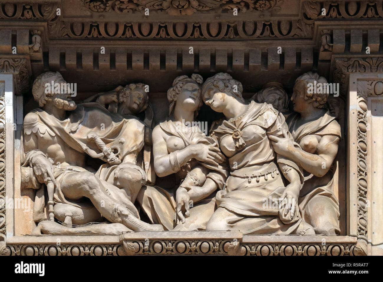 Esther and King Ahasuerus, marble relief on the facade of the Milan Cathedral, Duomo di Santa Maria Nascente, Milan, Lombardy, Italy Stock Photo