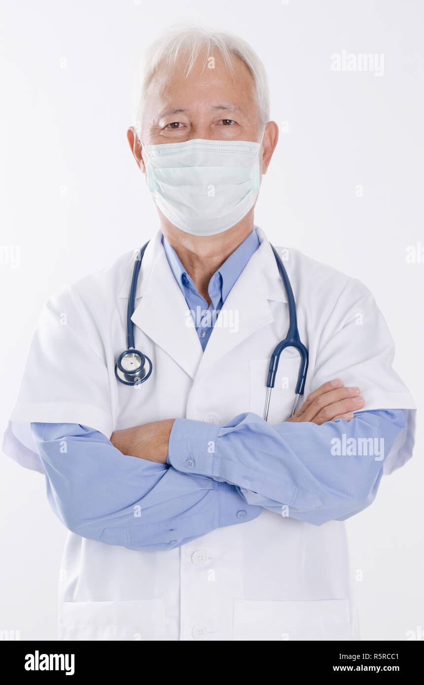 Old Asian medical doctor in face mask Stock Photo