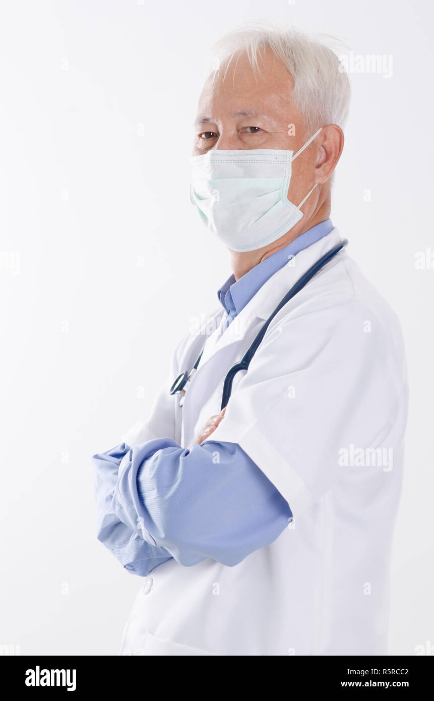 Asian medical doctor in face mask Stock Photo