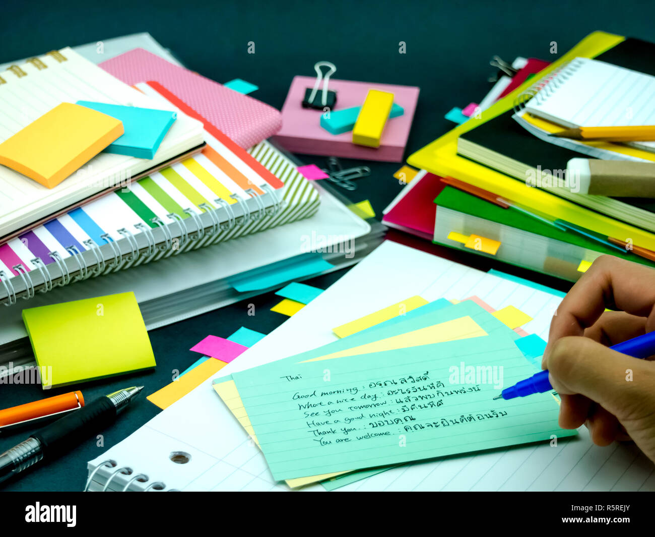Learning New Language Writing Words Many Times on the Notebook  Thai Stock Photo