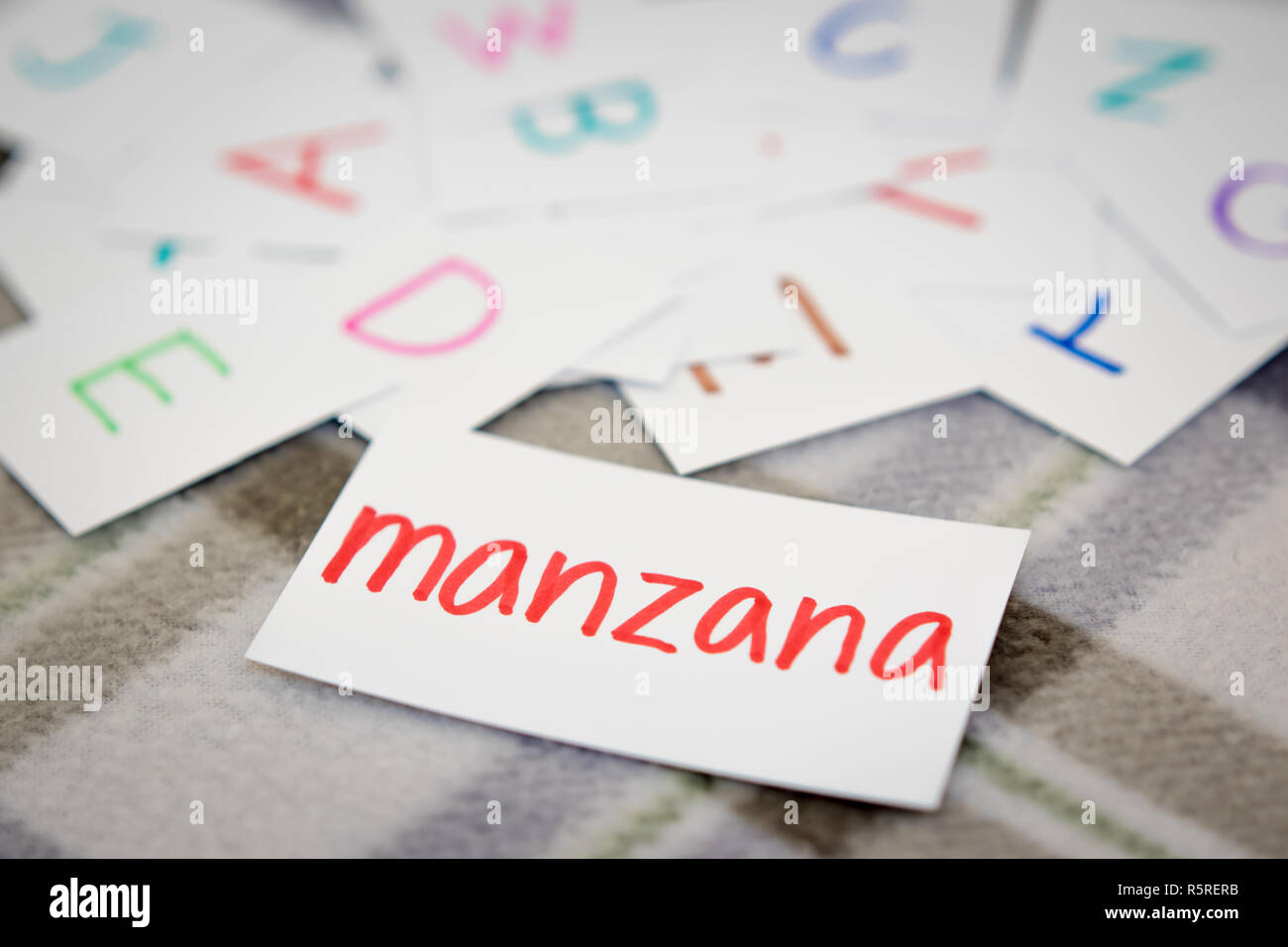 Spanish  Learning the New Word with the Alphabet Cards Stock Photo