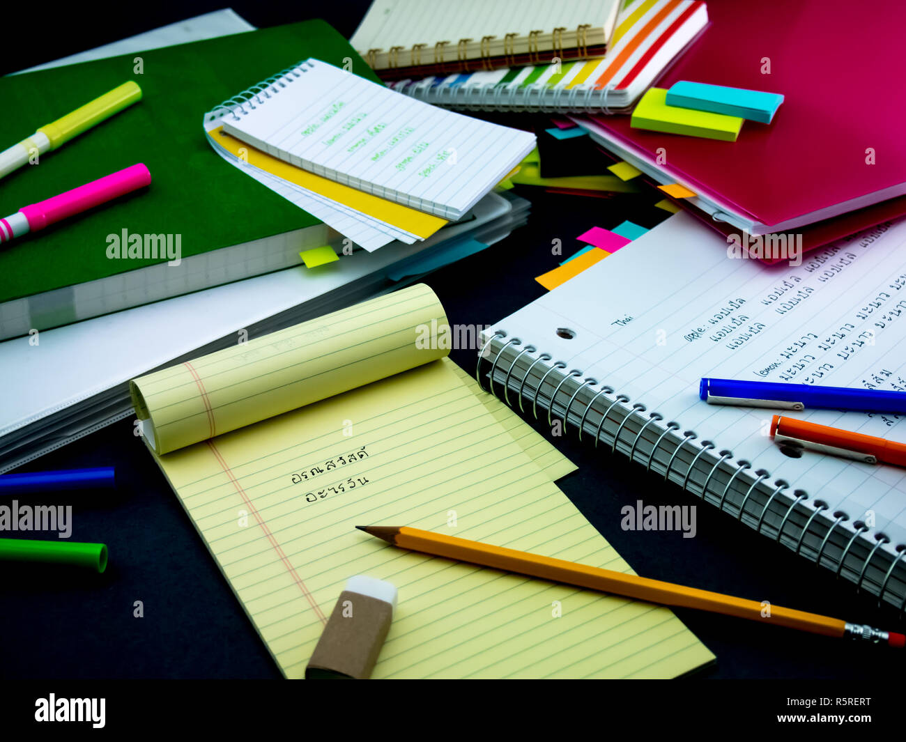 Learning New Language Writing Words Many Times on the Notebook  Thai Stock Photo