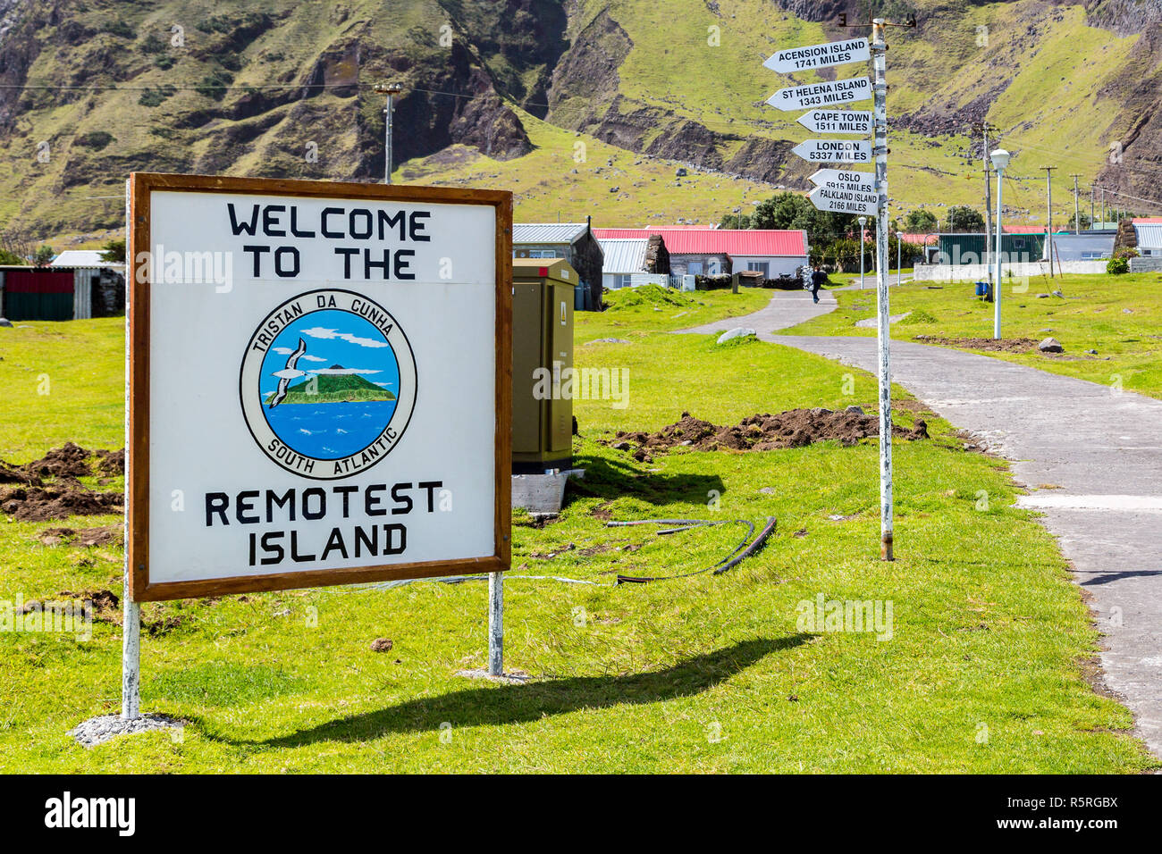 Welcome to the Remotest Island touristic signpost and distance fingerposts, town centre of Edinburgh of the Seven Seas, Tristan da Cunha Stock Photo