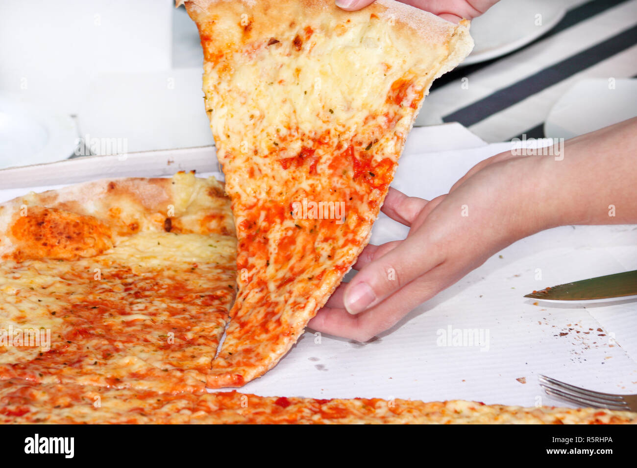 Hands Taking Slices Of Pizza Margarita Hand Drawn On Pieces Of Delicious Pizza Close Up Italian Traditional Classic Pizza Being Held In Box Stock Photo Alamy