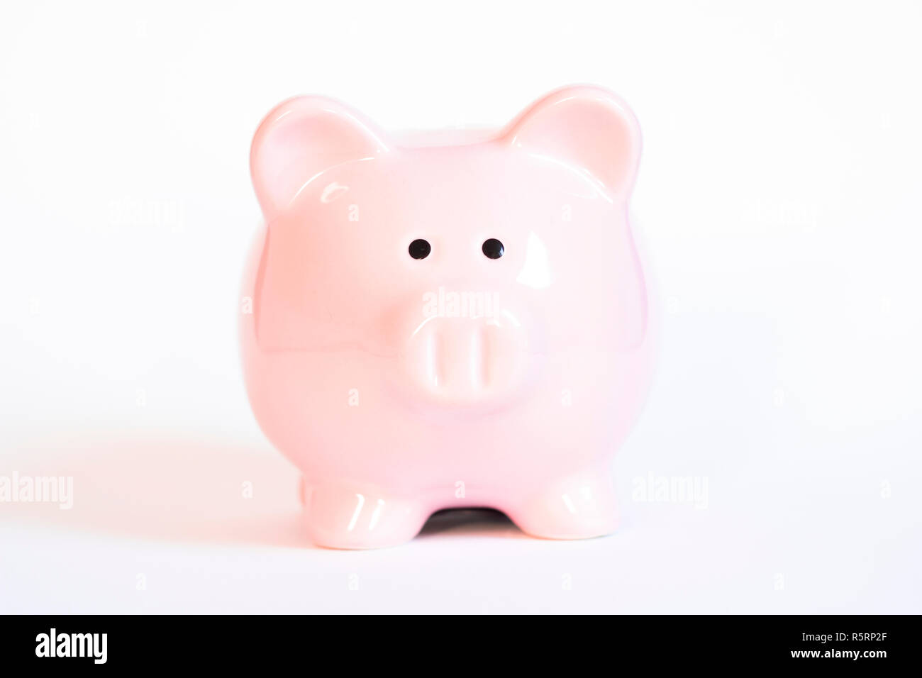 pink ceramic piggy bank Stock Photo - Alamy