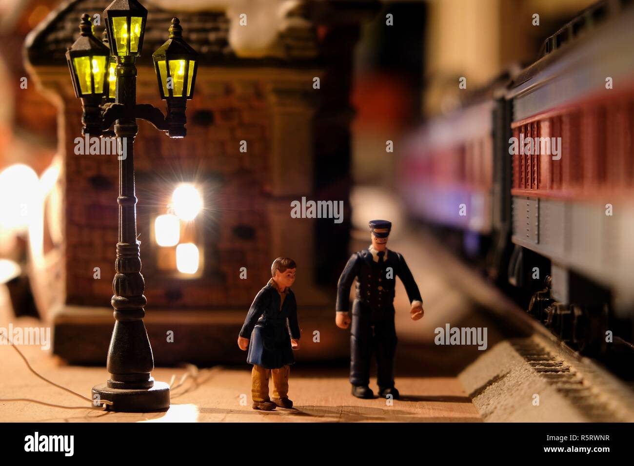 LAFAYETTE, ALABAMA - NOVEMBER 23, 2018: The little boy and the conductor from the Polar Express story as little figurines as part of a toy electric tr Stock Photo