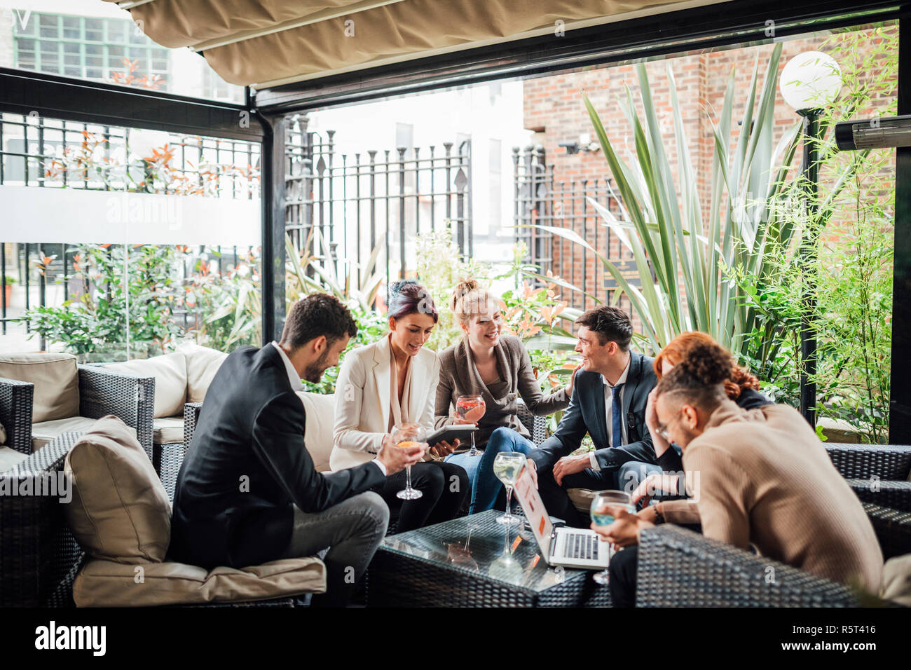 Business People Drinking After Work Stock Photo Alamy