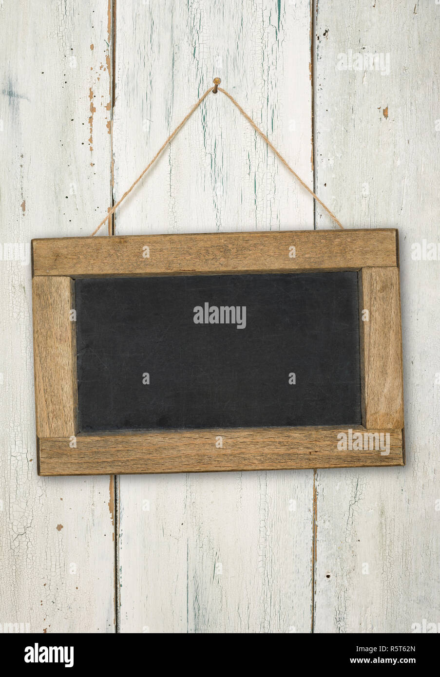 slate on white board wall Stock Photo - Alamy