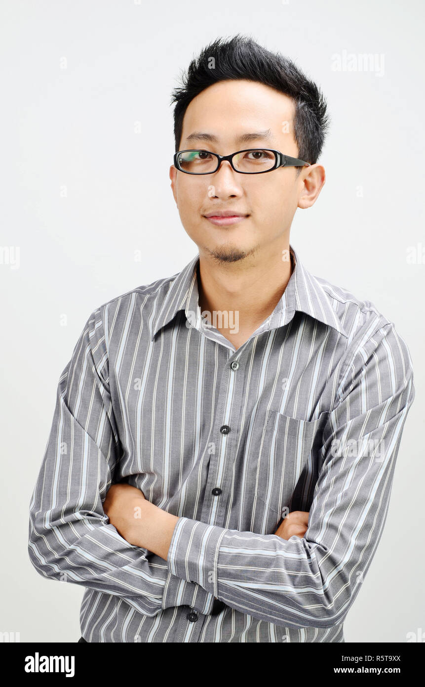 Asian businessman arms crossed Stock Photo - Alamy