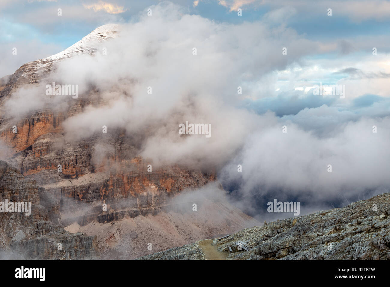 Tofana di Rozes mountain peak of the Tofane group. The Ampezzo Dolomites, Clouds. Dolomiti. Veneto. Italian Alps. Europe. Stock Photo