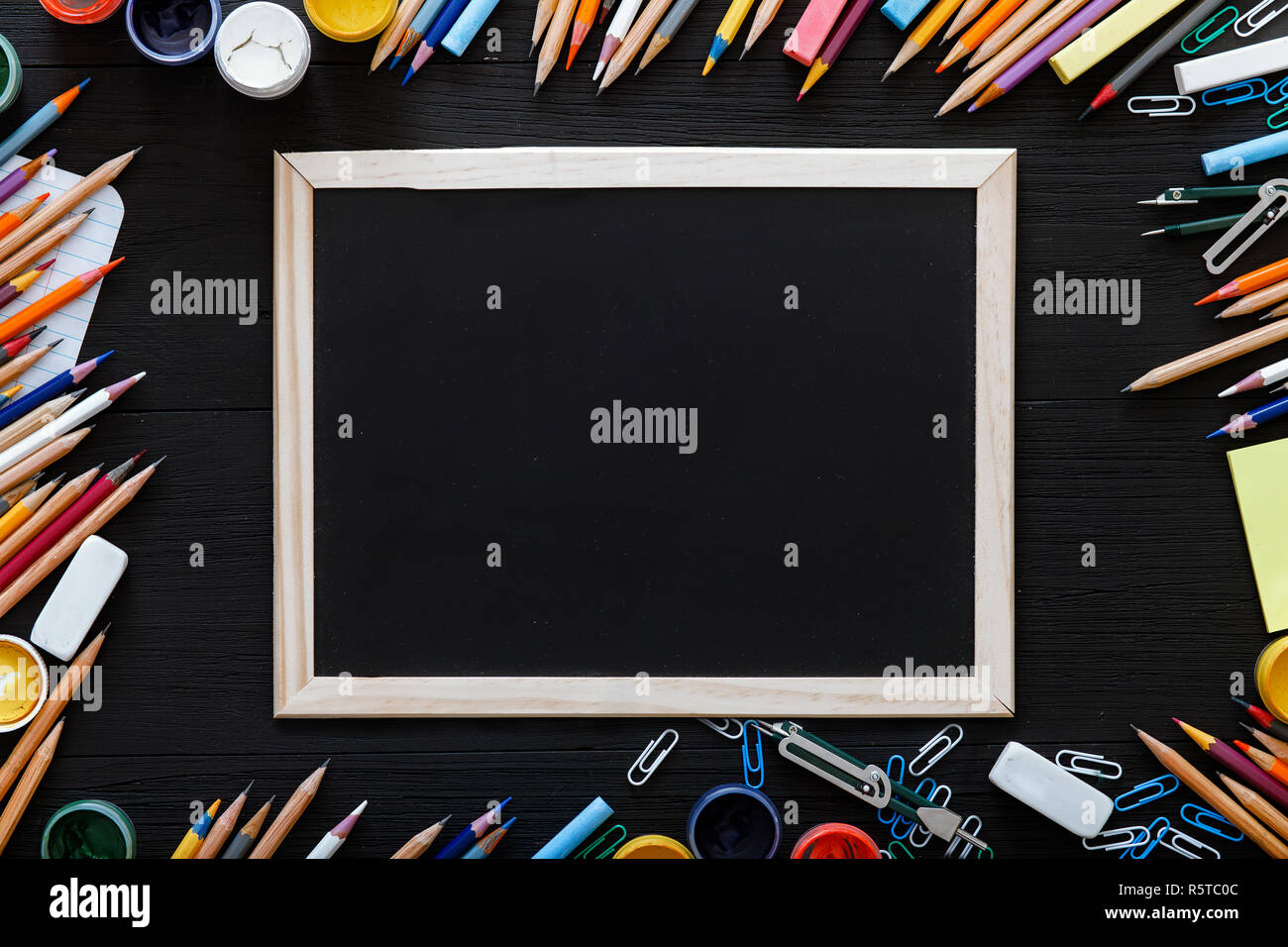 Welcome Back To School Background With Kids Supplies For Modern Primary Education Color Pencils Paints And Frame On Dark Black Wooden Pupils Desk W Stock Photo Alamy