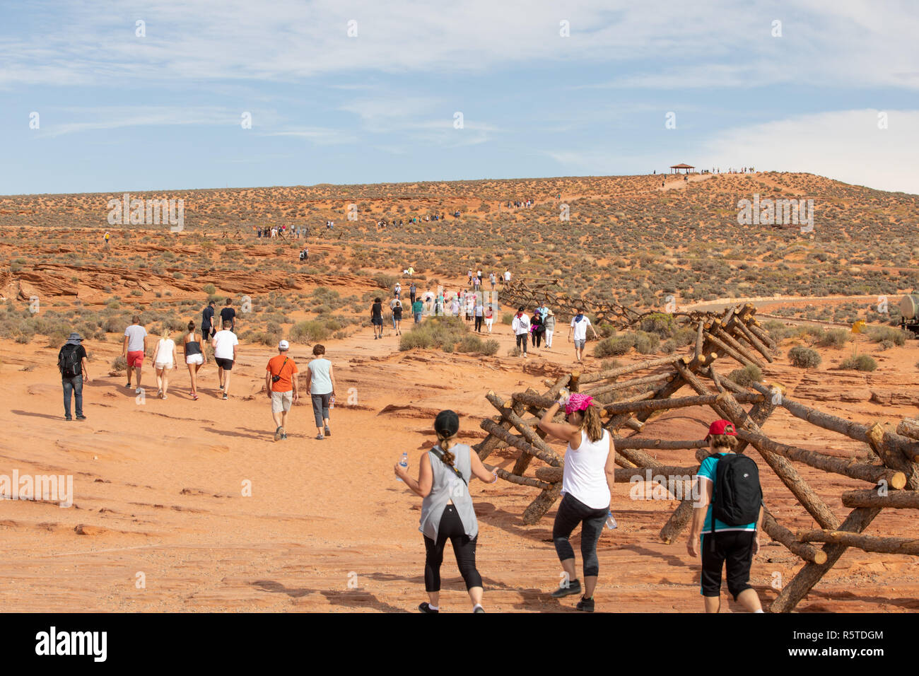 Hikers walking back to the parking lot after visiting Horseshoe Bend in